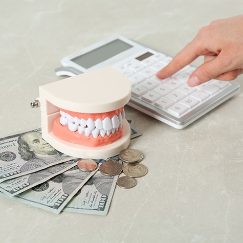 Calculator, money, and mouth mold in Doylestown