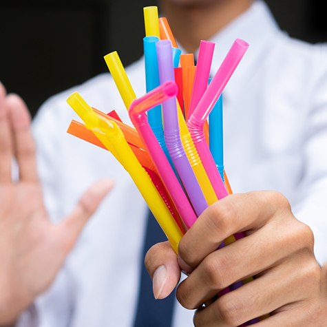 Man saying no to straws after dental implant surgery