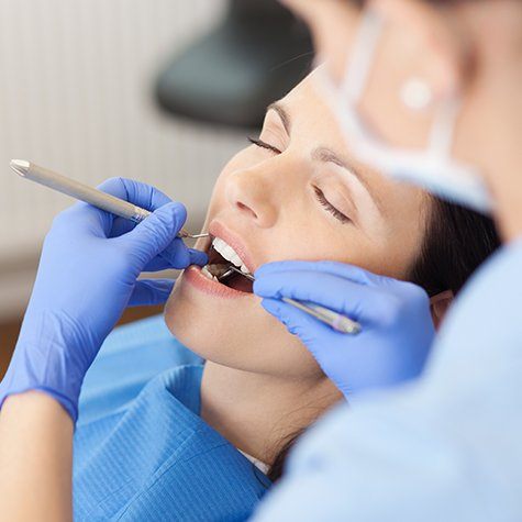Sedated dental patient during dentistry treatment